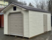 10 x 16 Front Entry Vinyl Peak Shed w/ Garage Door