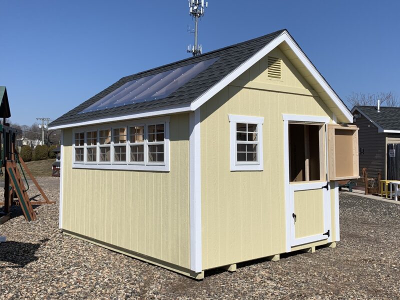 10x14 Arlington Garden Shed in Cream with White trim and Charcoal shingles.