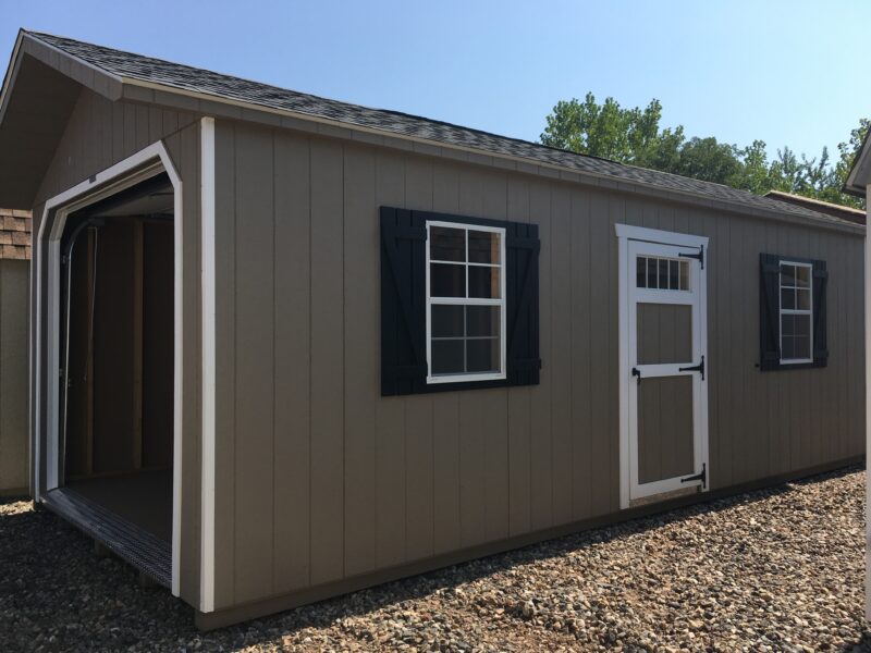 12x24 Single Car Garage in PC Clay with White trim and Oyster Grey shingles.