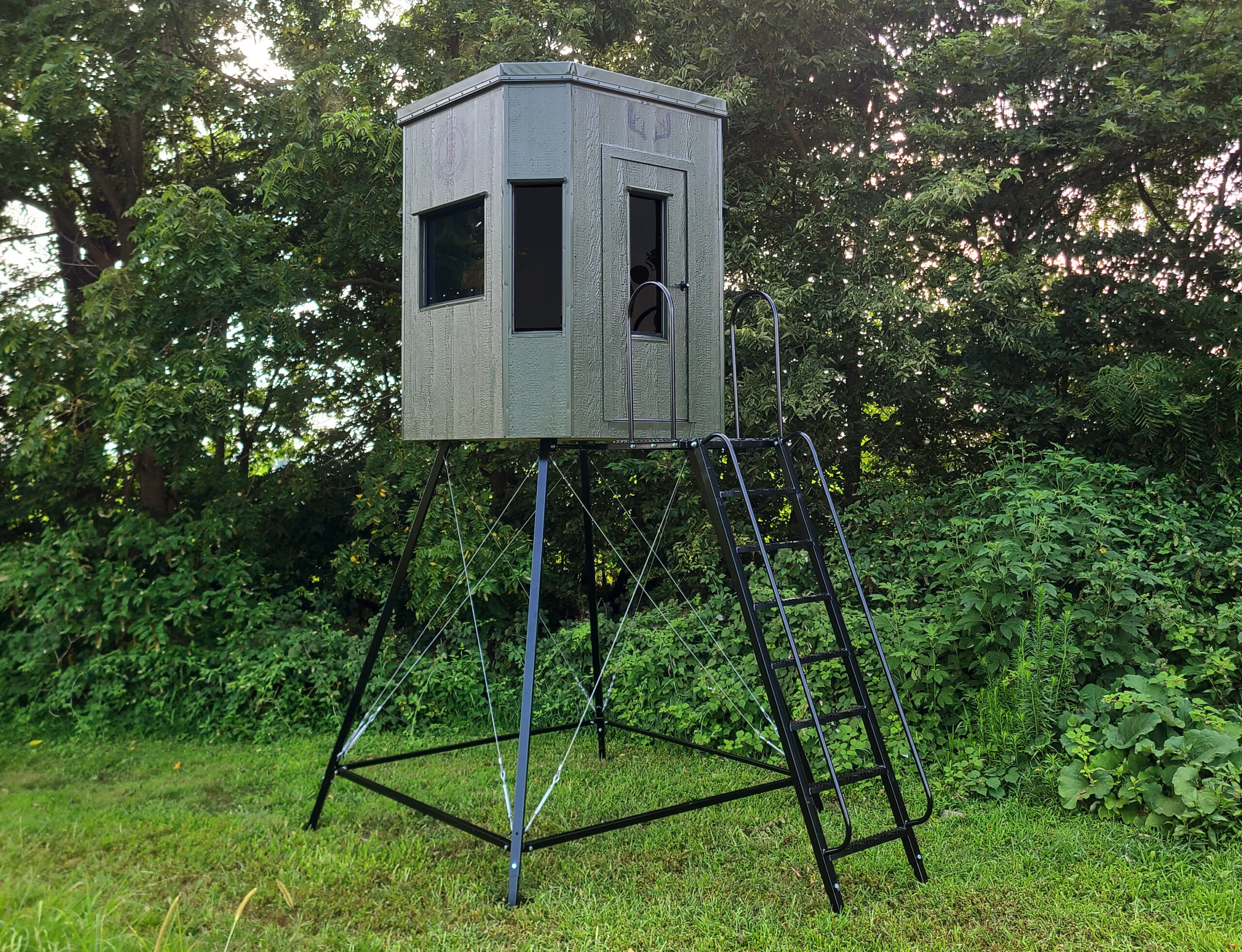 6x6 Octagon Hunting Blind with 8'-11' Adjustable Metal Stand and Ladder with Hand Rails Available At Pine Creek Structures