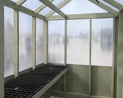 6x8 small ready made backyard greenhouse interior from Pine Creek Structures