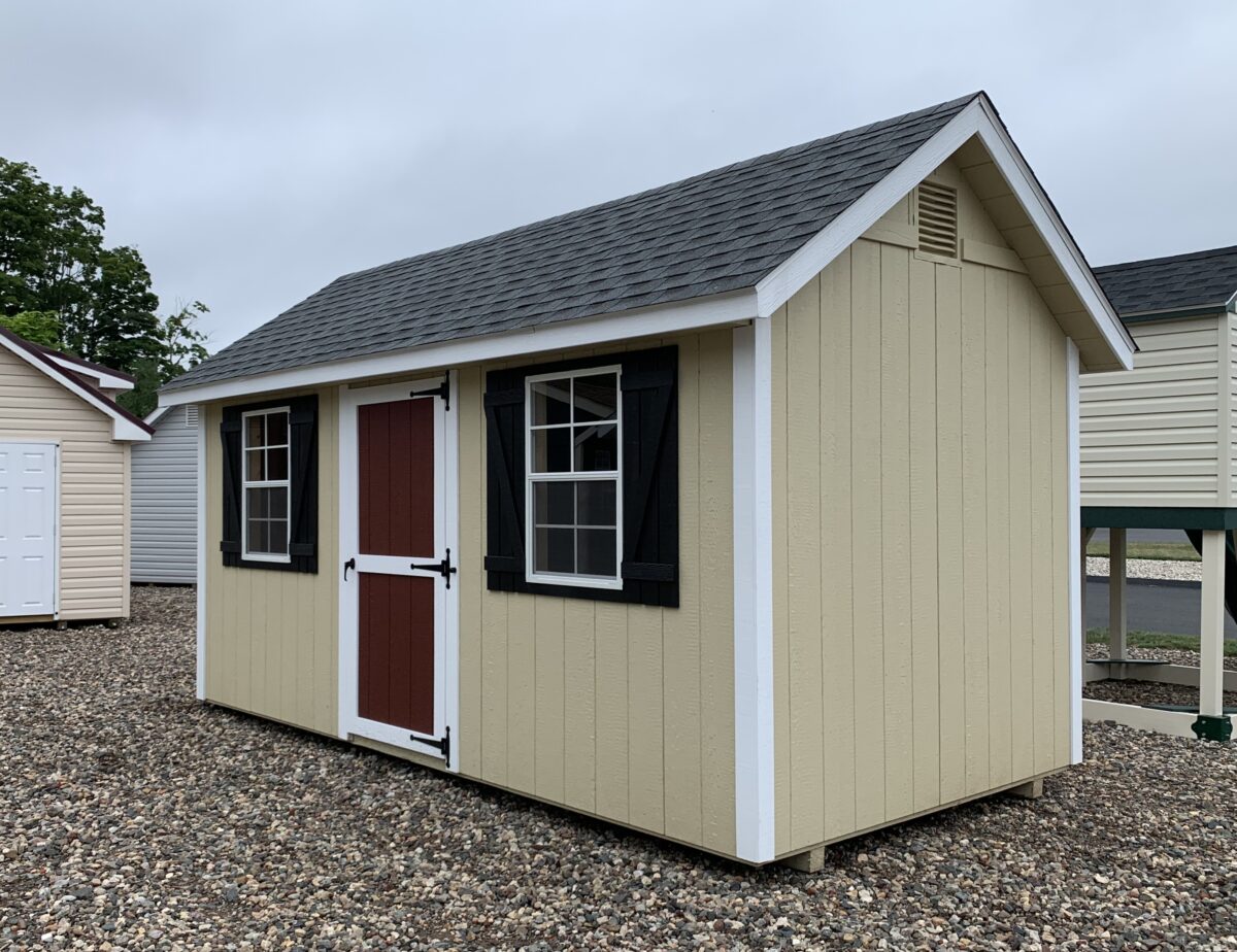 8x16 Cape Style Storage Shed in Beige with White trim and Black Z shutters in Berlin, CT.