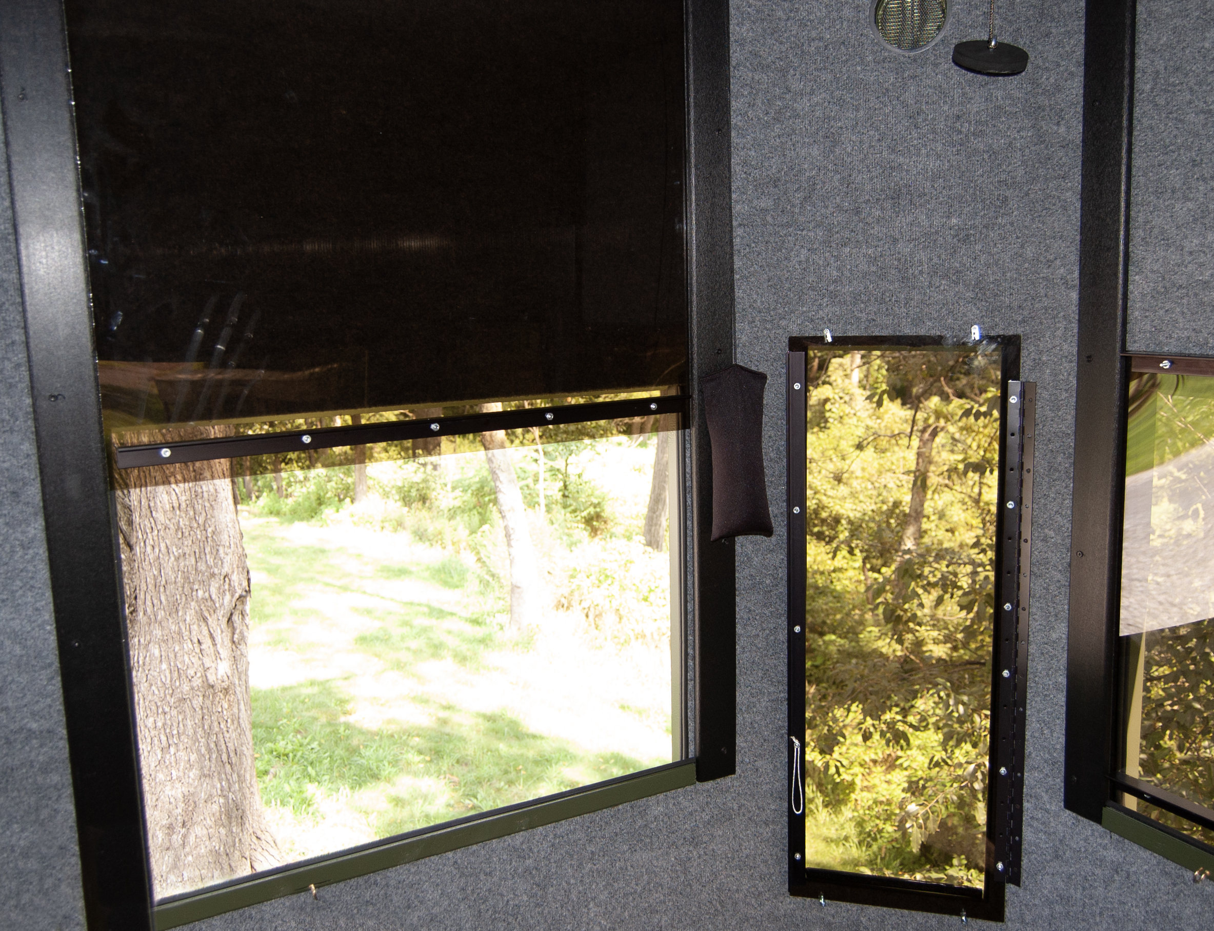 Fully Carpeted Hunting Blind Interior With Open Window Available At Pine Creek Structures