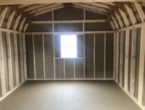 Inside of 12x16 wooden Dutch barn storage shed
