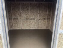 Inside of 8x12 wooden peak side storage shed