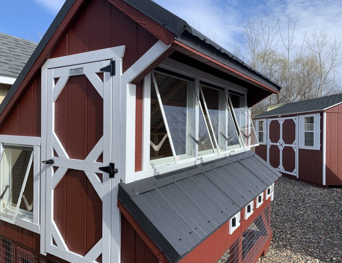 Exterior view of adjustable windows on an Amish-built chicken coop in CT.