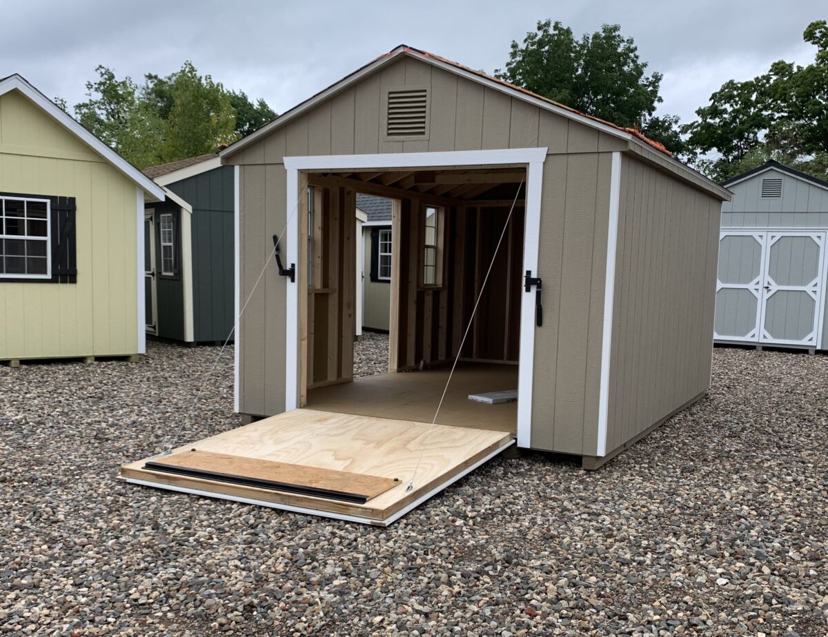 10x14 Peak Style Shed with 6x6 Rampage Door ramp down in Berlin CT