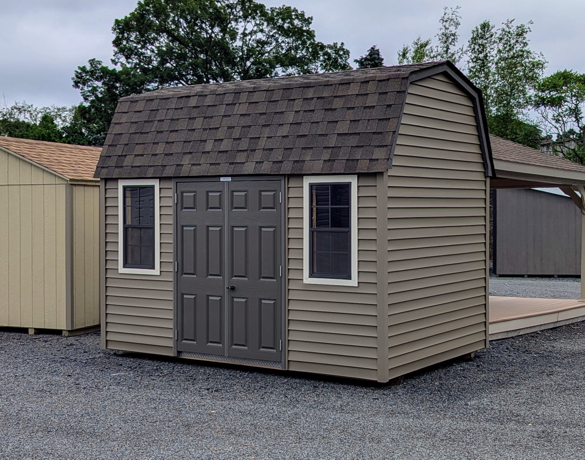 8x12 Dutch with java vinyl siding and bronze trim