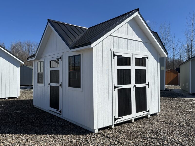 10x14 Victorian storage shed with white siding and black metal roof in Berlin CT.