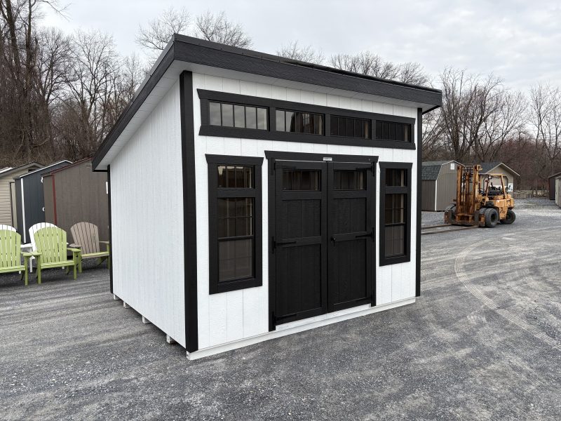 white 10x12 studio garden shed with double doors and transom windows