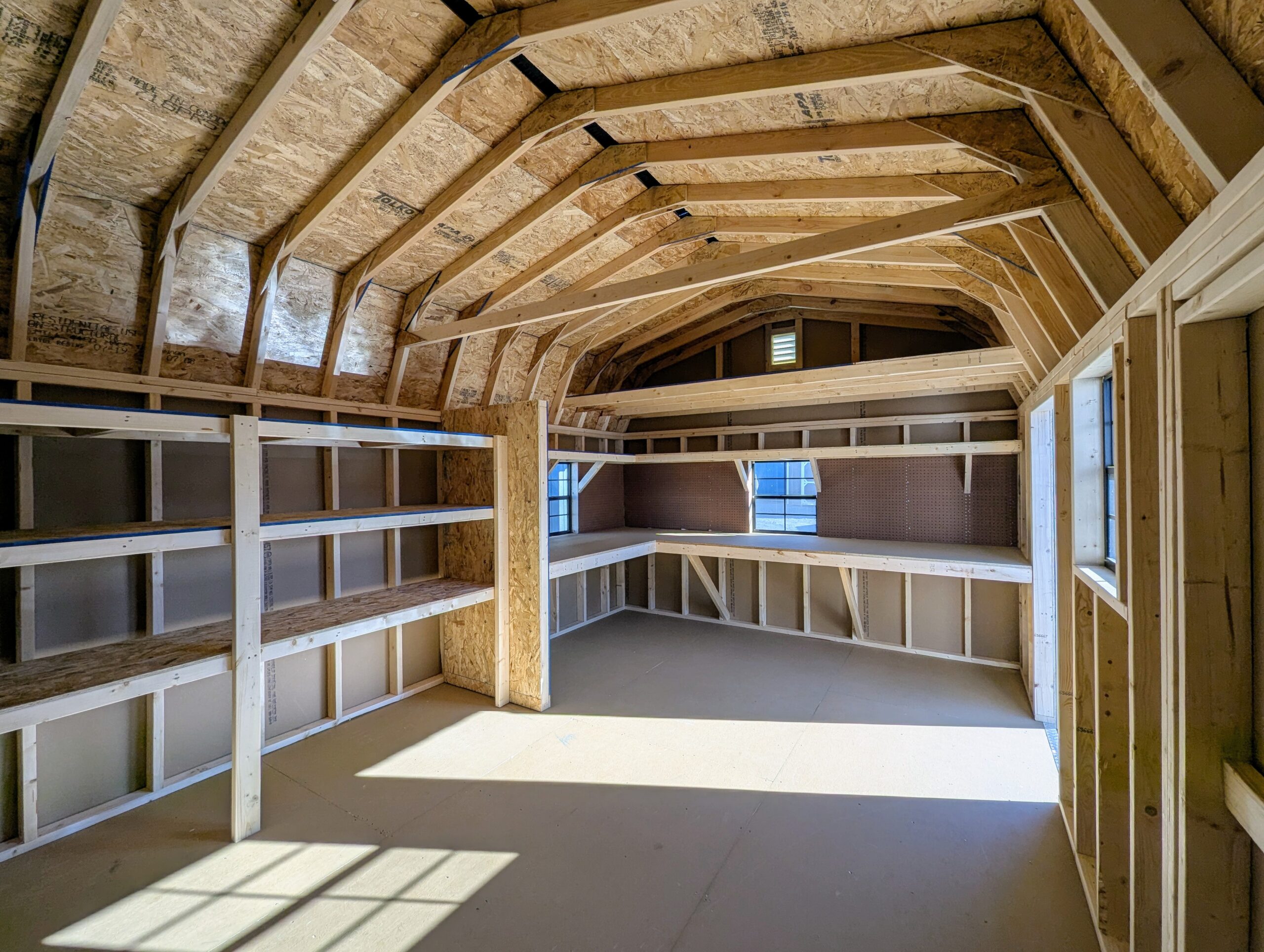 Interior 12x20 Dutch storage shed with loft and shelves