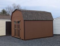 10x14 Madison Series Dutch shed painted in chestnut with dark brown trim