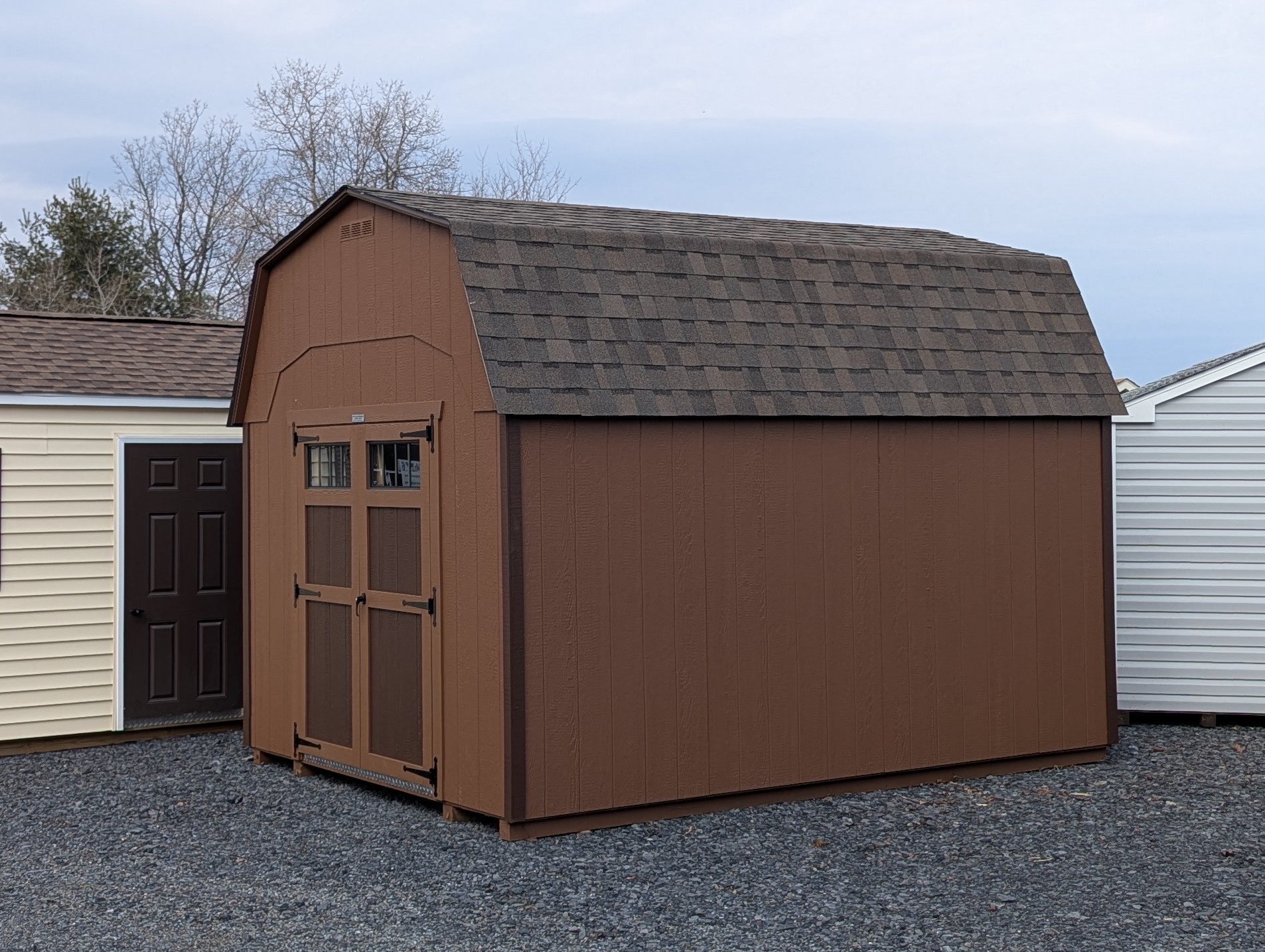 10x14 Madison Series Dutch shed painted in chestnut with dark brown trim