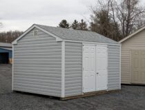 10x12 Madison Series peak shed in harbor stone vinyl siding with white trim