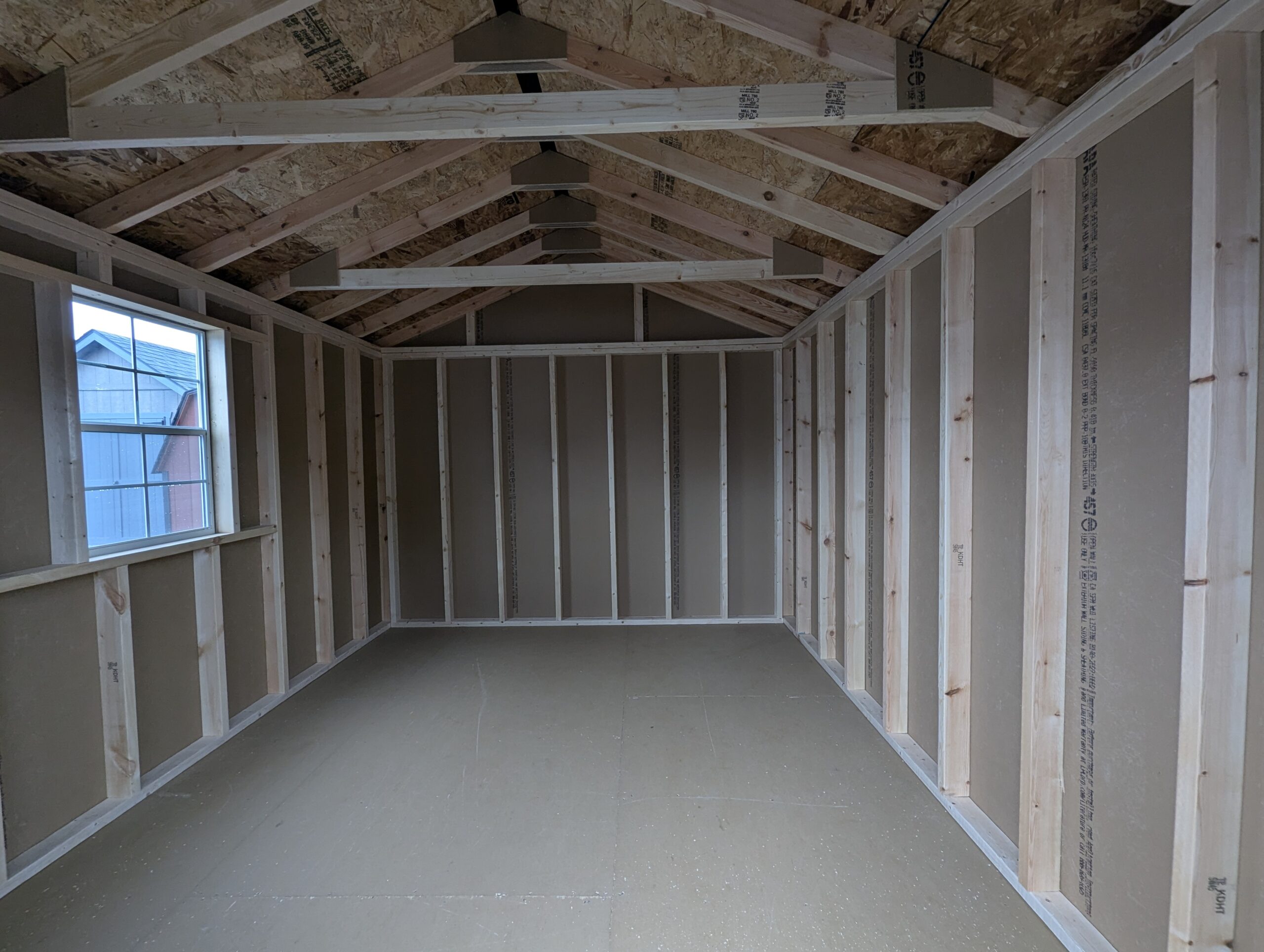 Interior of a 10x12 Peak Series shed with 2x4 framing at 16" on-center