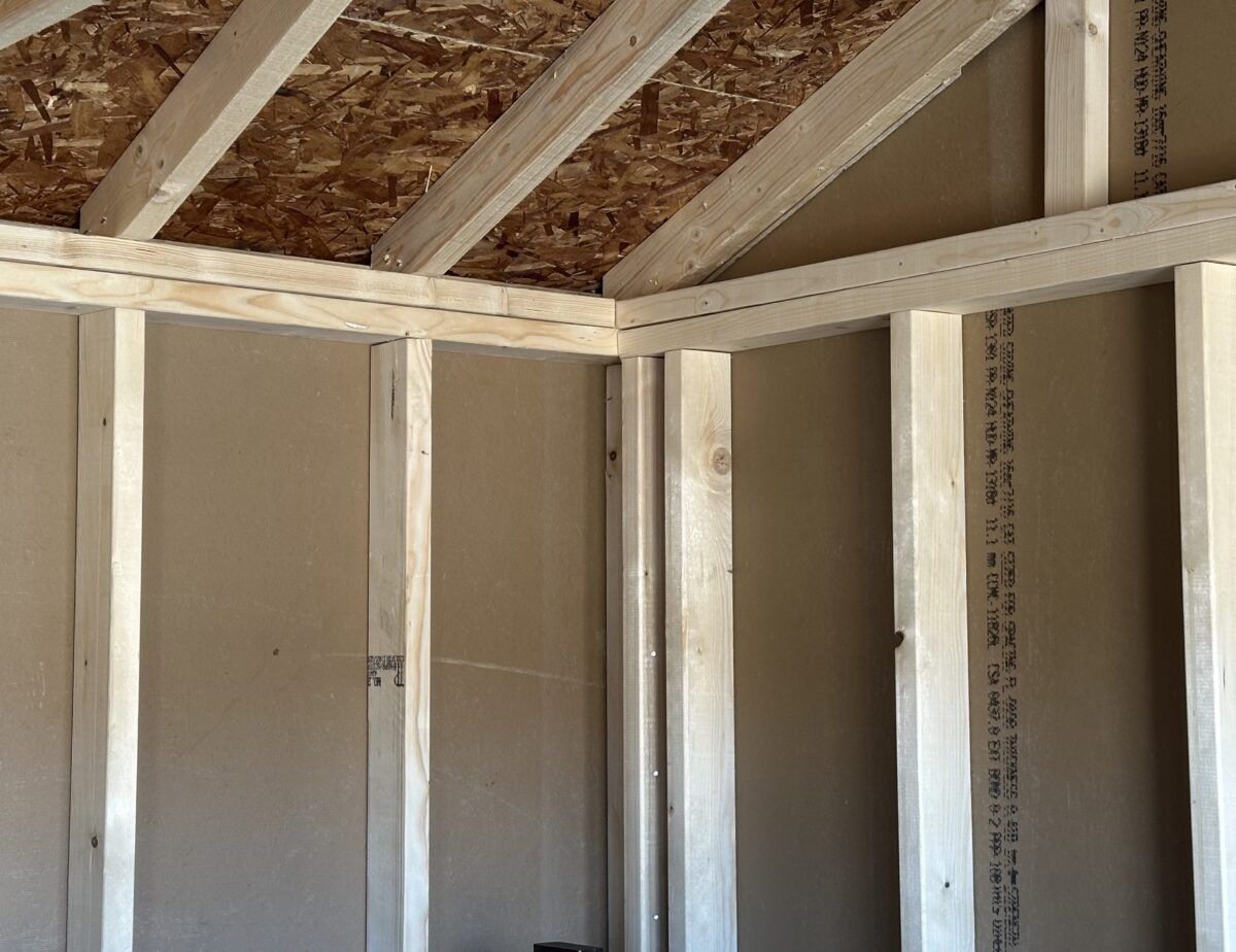 Interior of 10x12 Peak shed showing 25-year PerformMax floor