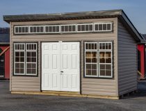 10x14 Studio Style Storage Shed with many windows and Pebble Clay vinyl siding