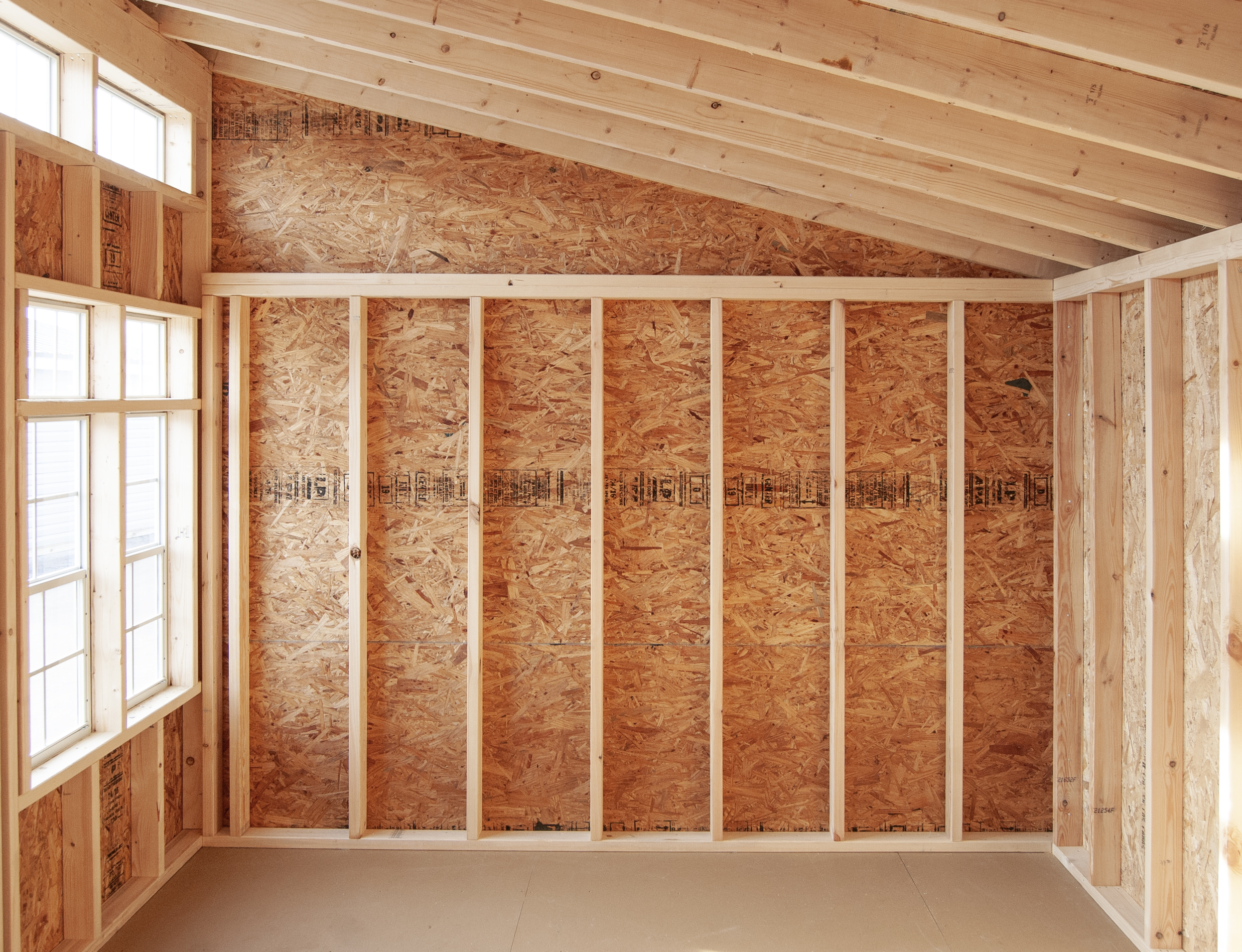 (Interior) 10x14 Studio Style Storage Shed with many windows and Pebble Clay vinyl siding