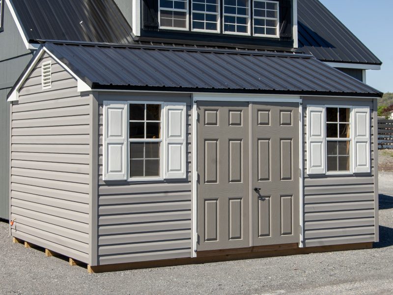 10x14 Peak Style Storage Shed with Gray Vinyl Siding, Black Metal Roof, Electric Package, and Built In Shelves
