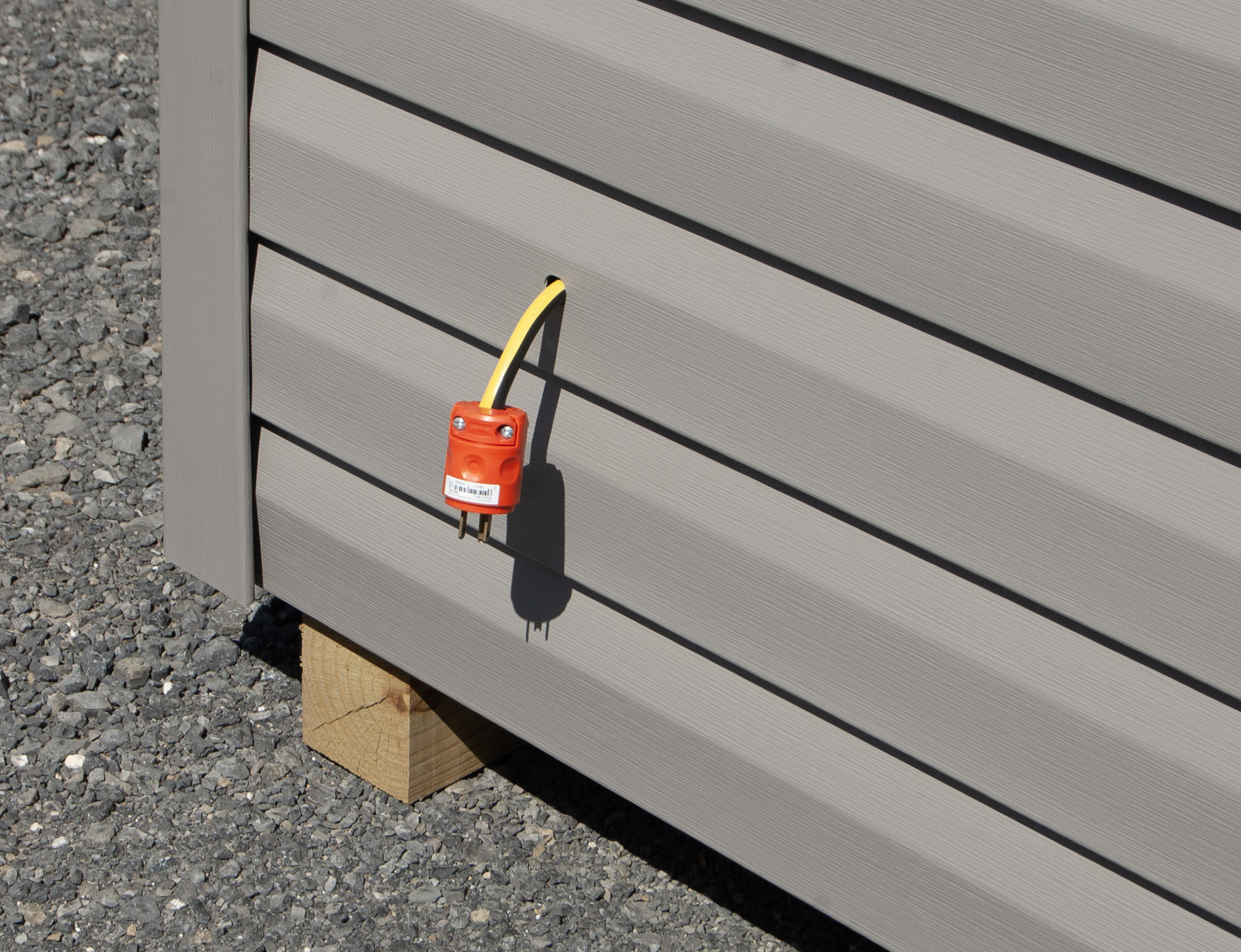 Electric Hookup on 10x14 Peak Style Storage Shed with Gray Vinyl Siding Electrical Package