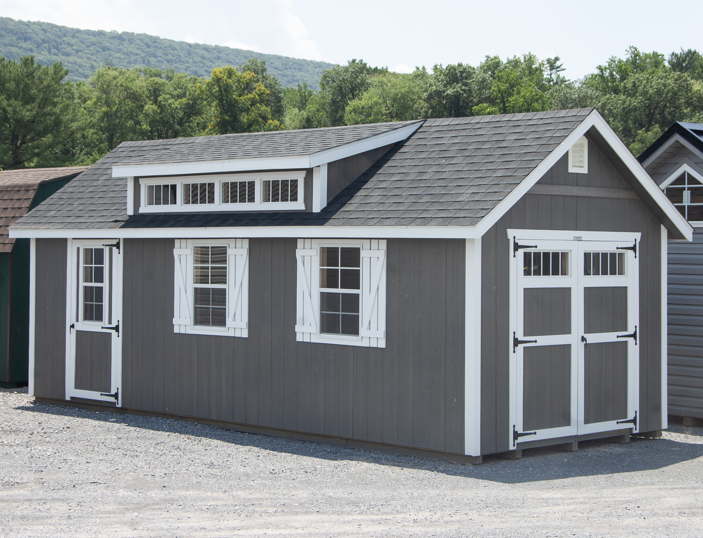 10x24 Cape Cod Style Storage Shed With A Cape Roof Dormer