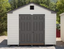 10x12 Madison Series (Economy Line) Storage Shed with peak roofline, vinyl siding, and fiberglass double doors