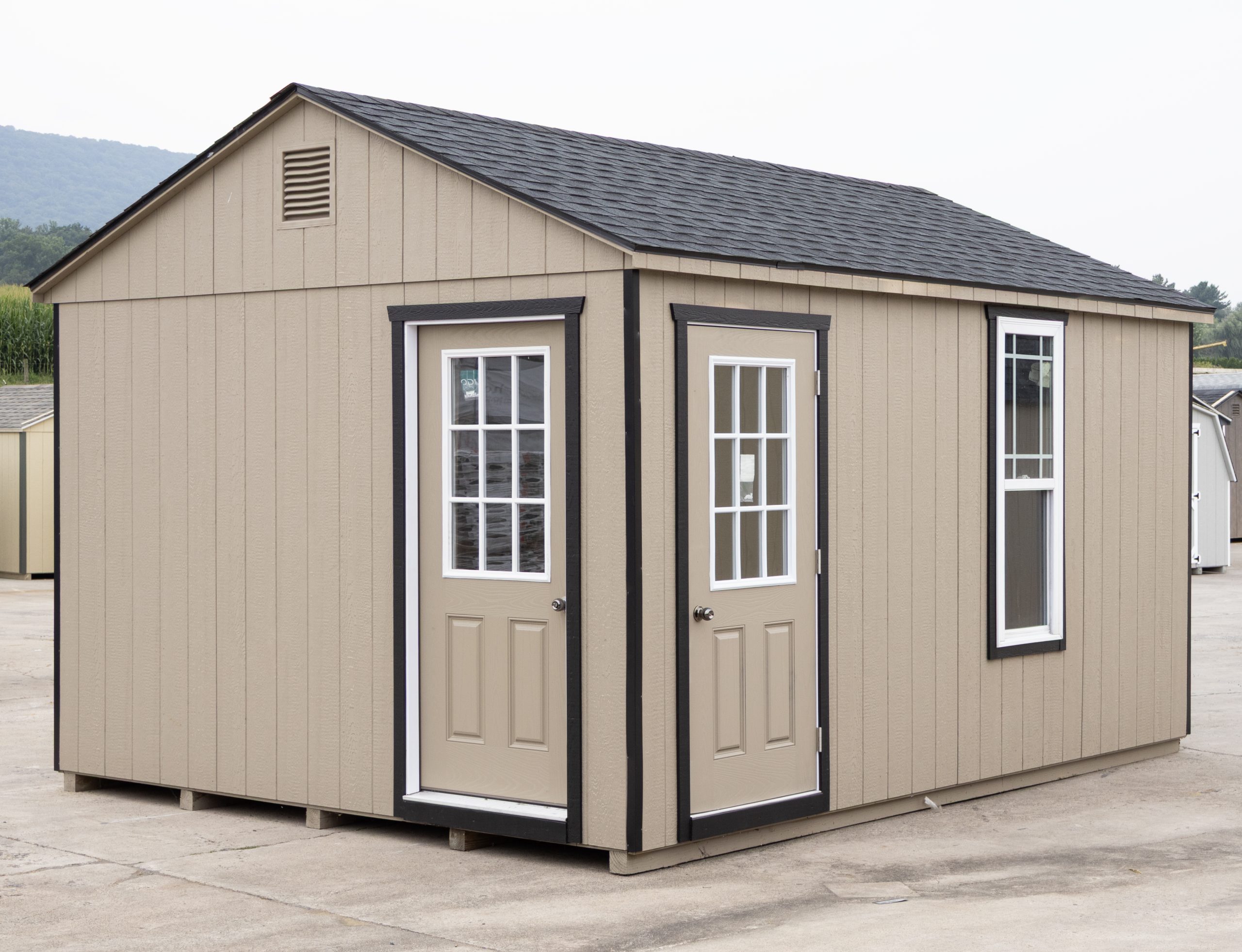 12x16 Custom Peak Style Storage Shed with Clay LP Siding and two house doors
