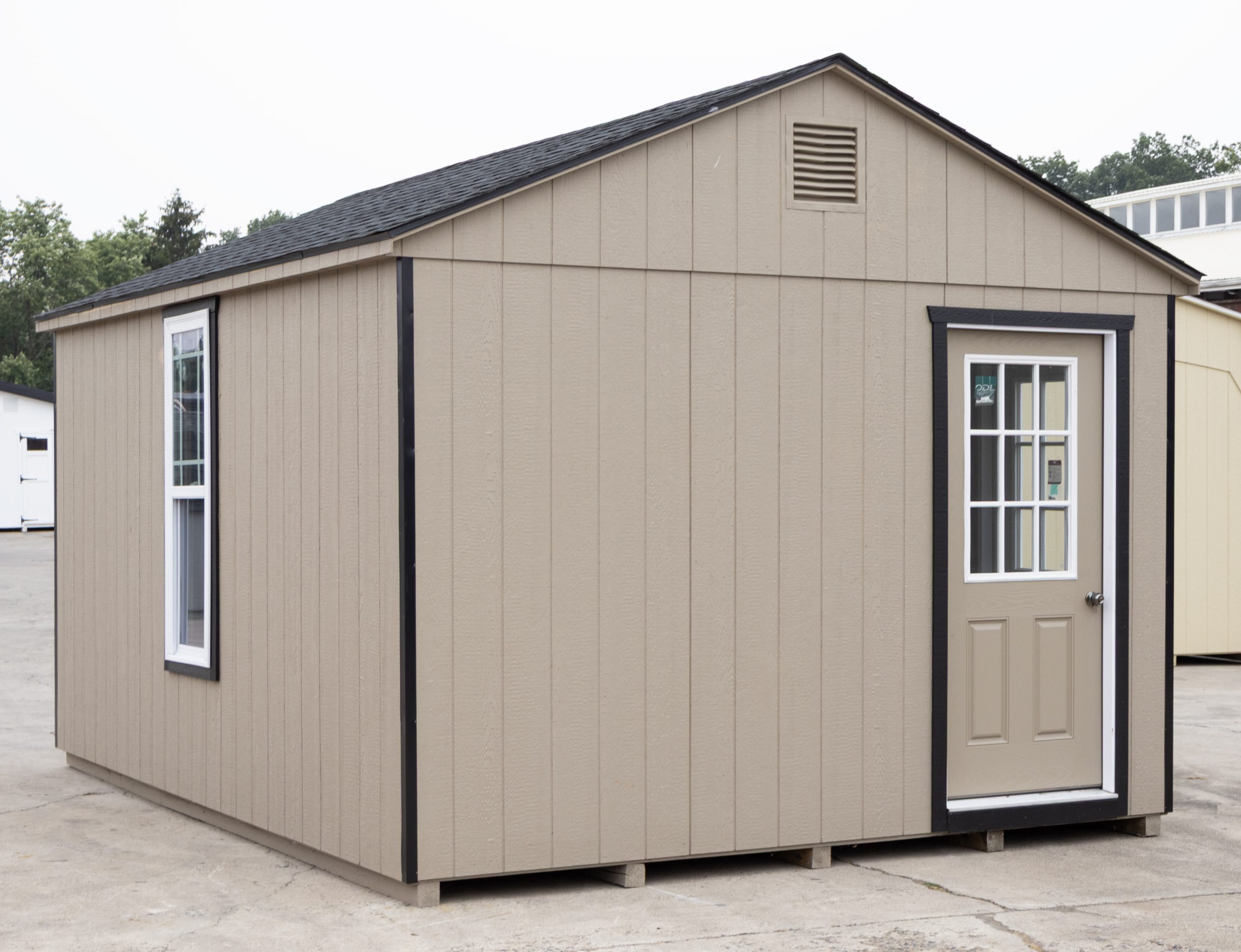 12x16 Customized Peak Style Storage Shed with Clay LP Siding, two house doors, and custom windows