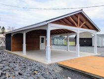 20×36 Veranda Cabana with a spacious covered patio, white posts and trim, natural wood ceiling accents, and a metal roof, set on a concrete pad for open-air outdoor living.