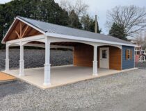 Angled view of a 20×36 Veranda Cabana showcasing the open pavilion-style front, exposed wood gable detail, and integrated enclosed room with entry door.