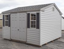 10x12 Peak Style Storage Shed With grey vinyl siding, double doors, two windows, and gable end vents
