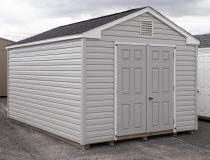 10x14 Peak Style Storage Shed With Vinyl Siding, Double Door in front, and window in back