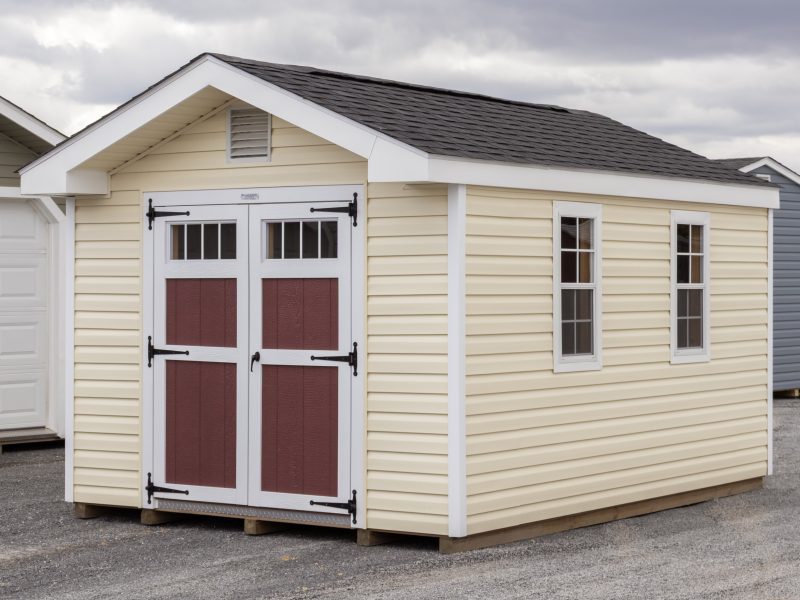 10x14 Front Entry Peak Style Storage Shed with Sunny Maize Vinyl Siding and Custom Red Doors with Windows