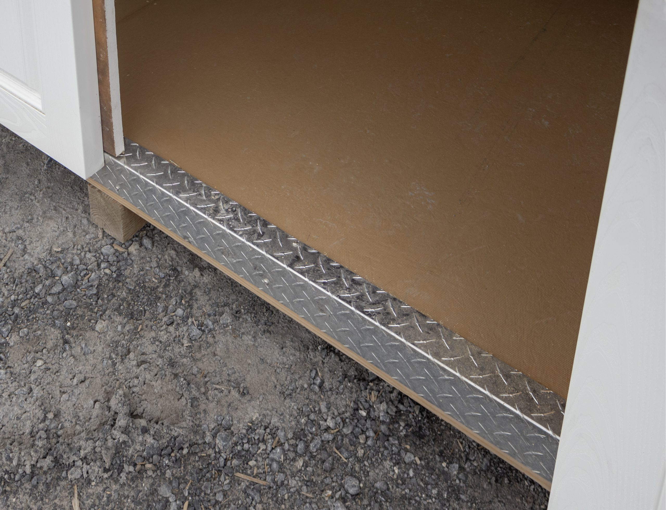 10x16 Dutch Barn Style Storage Shed with diamond tread plate at doorway