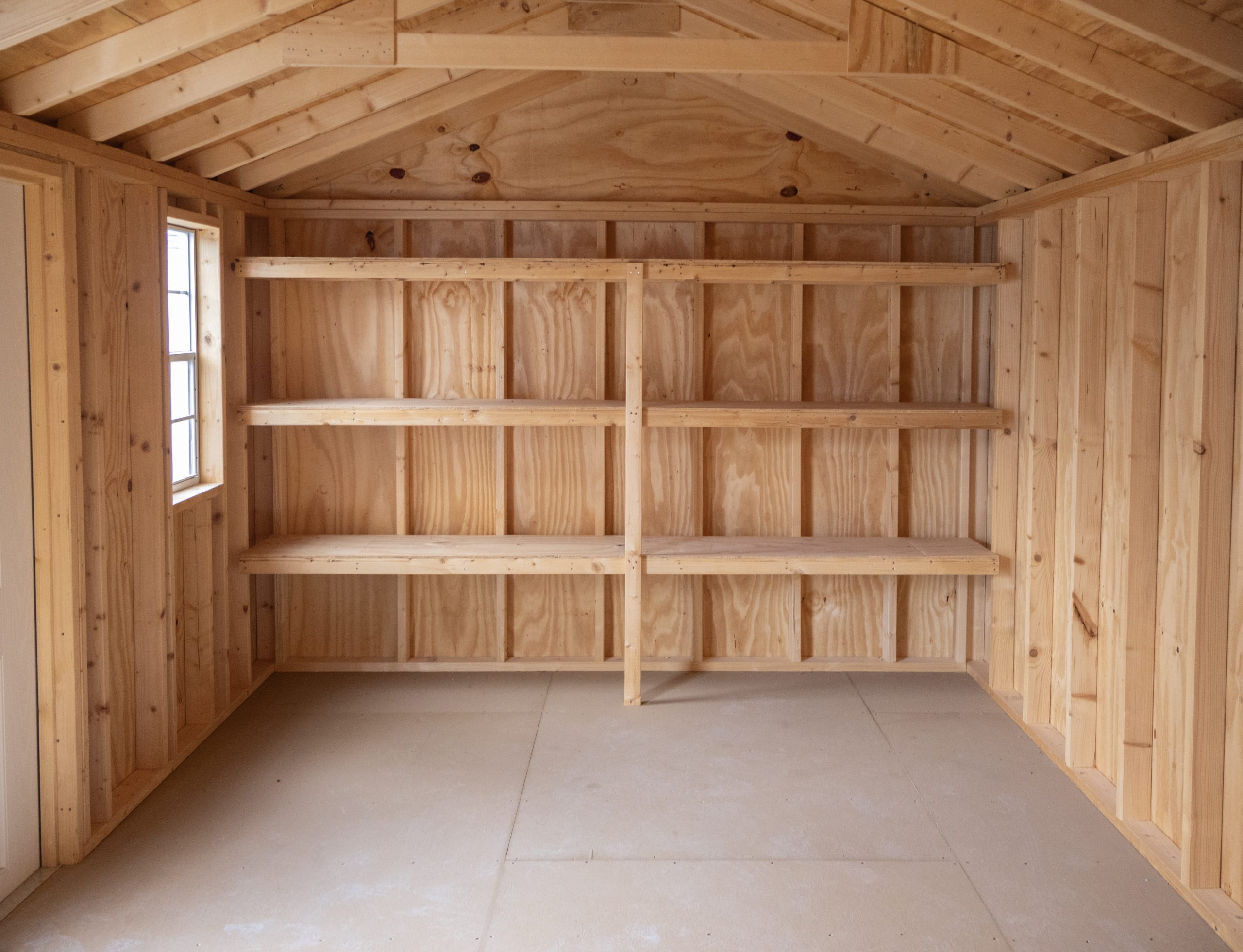 10x18 Peak Style Storage Shed with shelves built inside