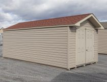 10x20 Peak Style Storage Shed with Clay Vinyl Siding and Red Shingles