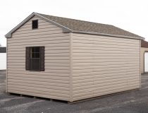 12x16 Front Entry Peak Shed with Vinyl Siding, double doors, a window in the back, and gable end vents