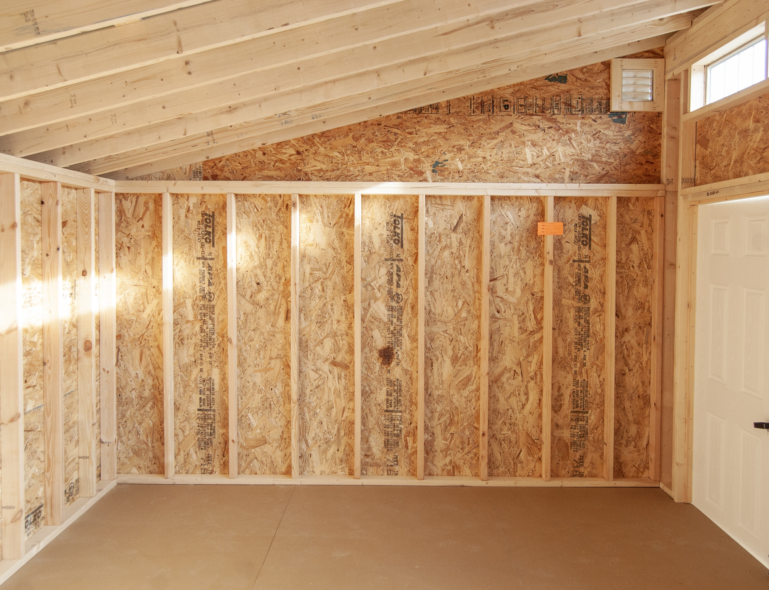 Inside of 12x16 Studio Style Storage Shed with many windows