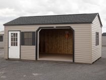 12x20 Custom Vinyl Peak Storage Shed with Overhead garage door and Workbench built inside