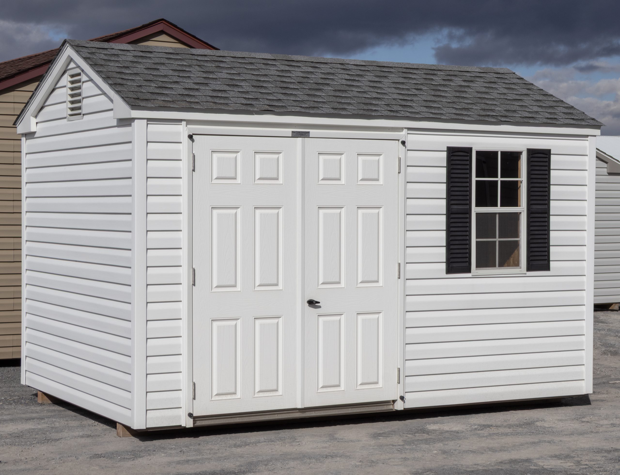 8x12 Vinyl Peak Style Storage Shed with Moveable Ramp System