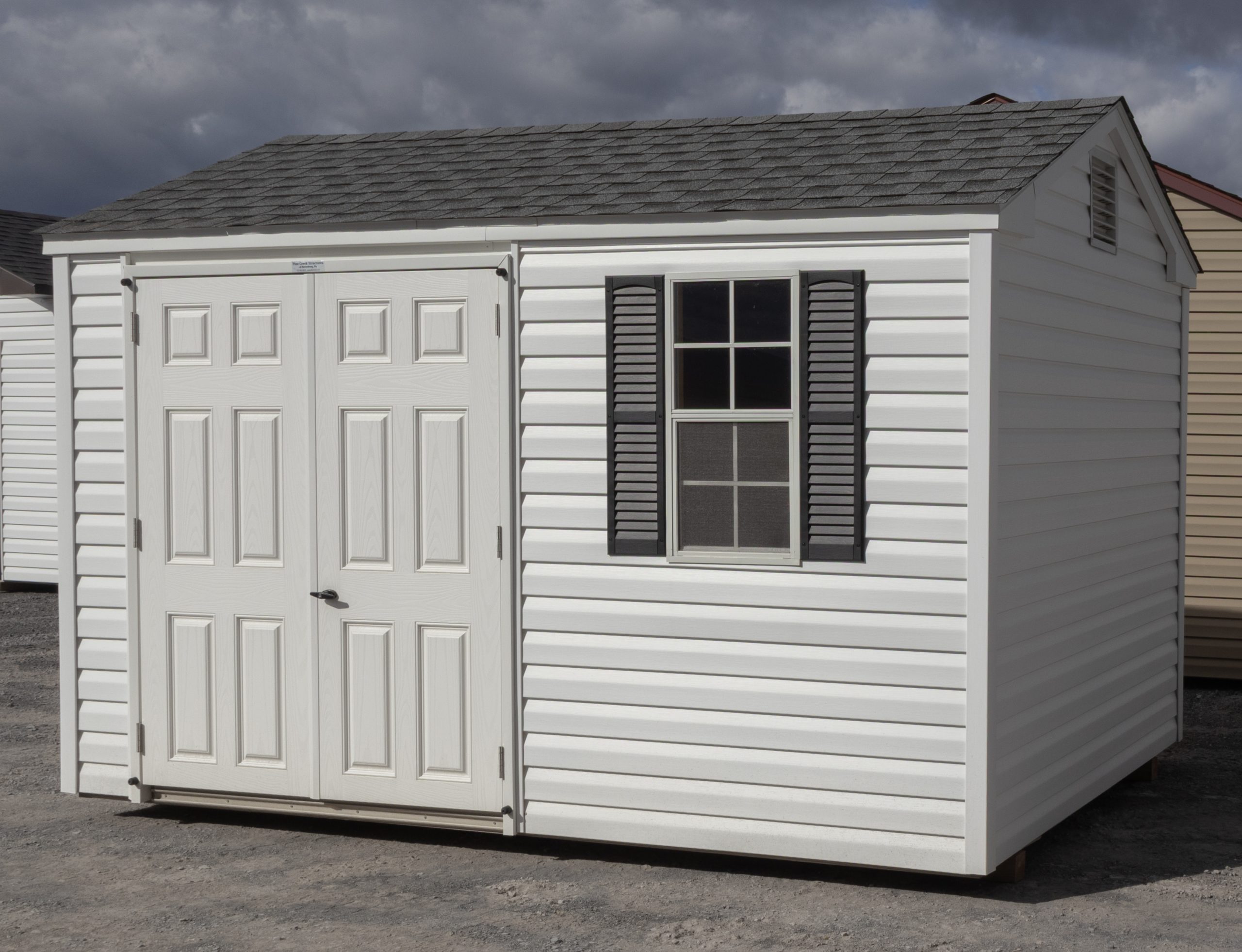 8x12 Vinyl Peak Style Storage Shed with Moveable Ramp System