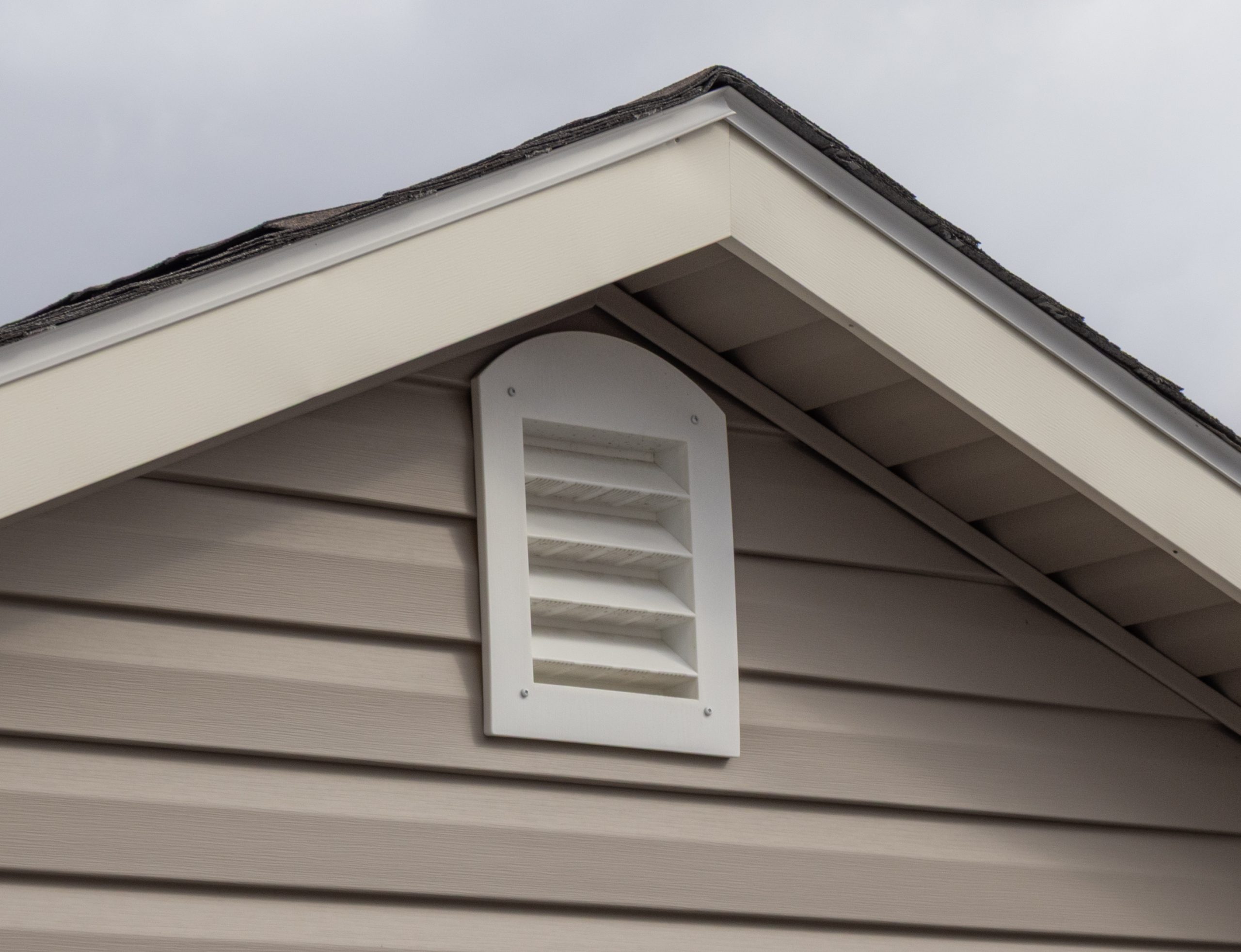 8x12 Custom Peak Style Storage Shed with Vinyl Siding, larger roof overhangs, and gable end vents
