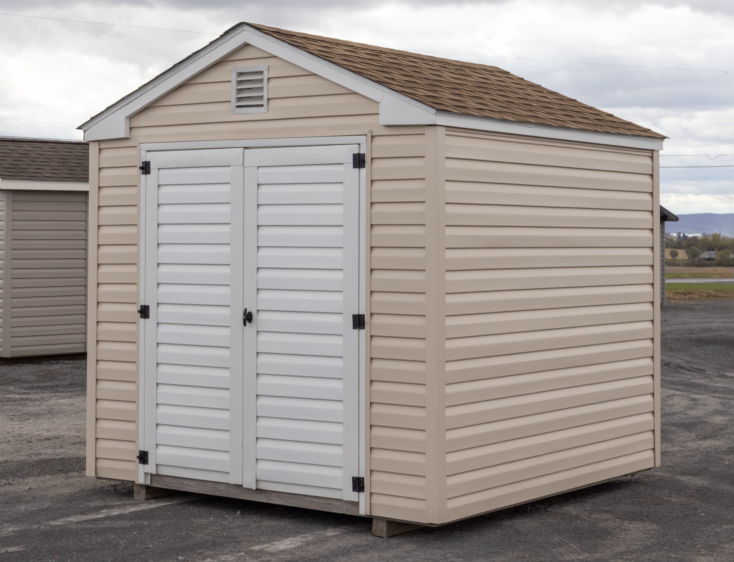 8x8 Vinyl Madison Peak Shed with Summer Wheat siding and Shakewood Shingles