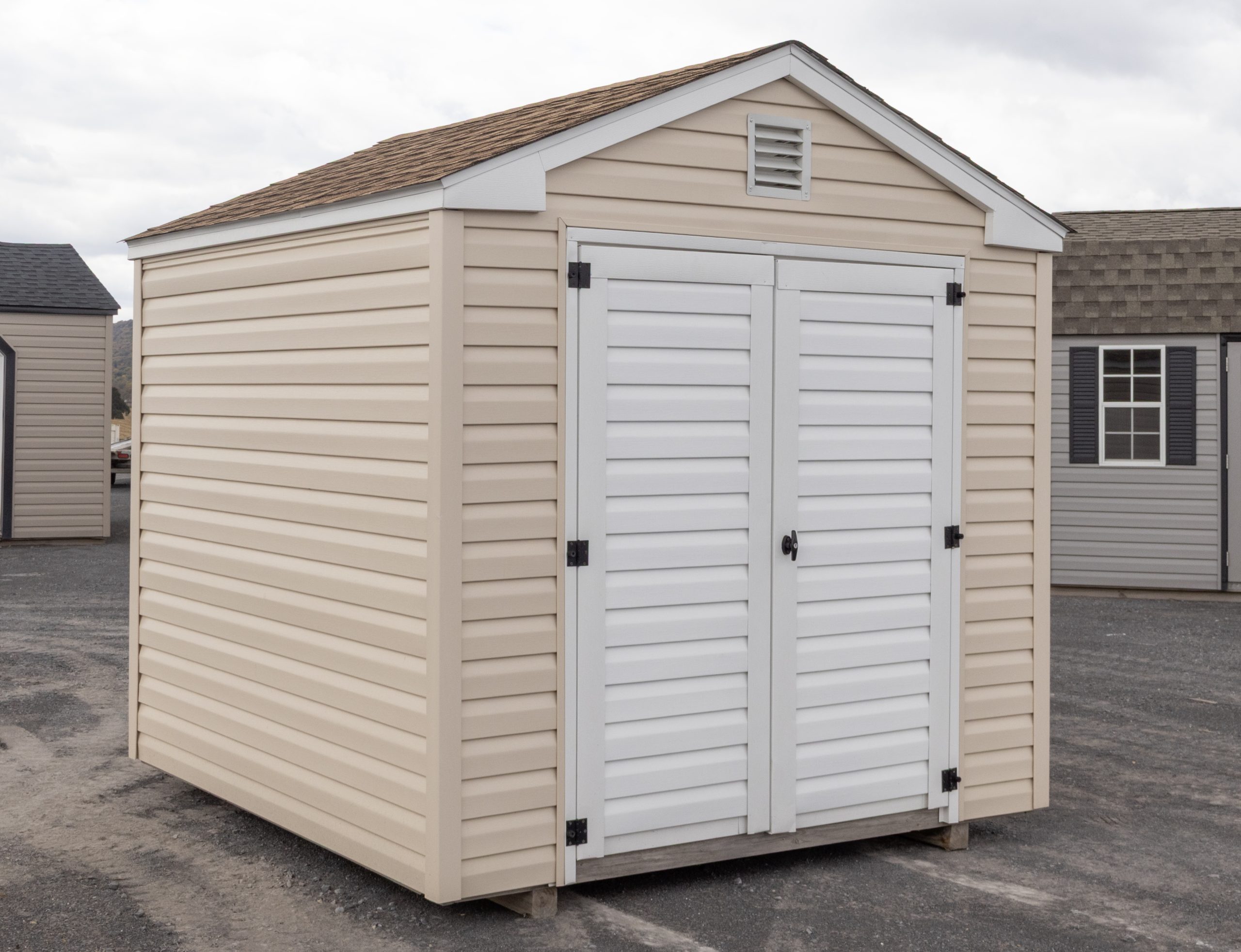 8x8 Vinyl Madison Peak Shed with Summer Wheat siding and Shakewood Shingles