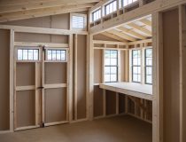 12x16 Custom Studio Style Storage Shed With Hemlock Porch and Workbench inside