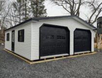 24x28 2-Car Modular Garage with White Siding Black Trim and Black Textured Metal Roof 1