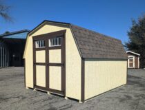 10x12 Mini Barn with Cream Siding, Dark Brown Trim, and Rustic Slate Shingles
