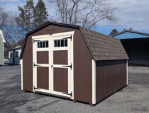 10x12 Madison Mini Barn with Dark Brown Siding and Navajo White Trim with Rustic Slate Shingles