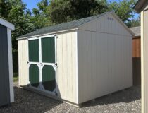 10x12 Madison Peak storage shed in Navajo White with Forest Green double doors