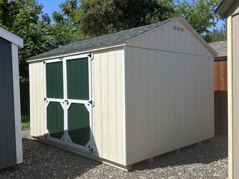 10x12 Madison Peak storage shed in Navajo White with Forest Green double doors